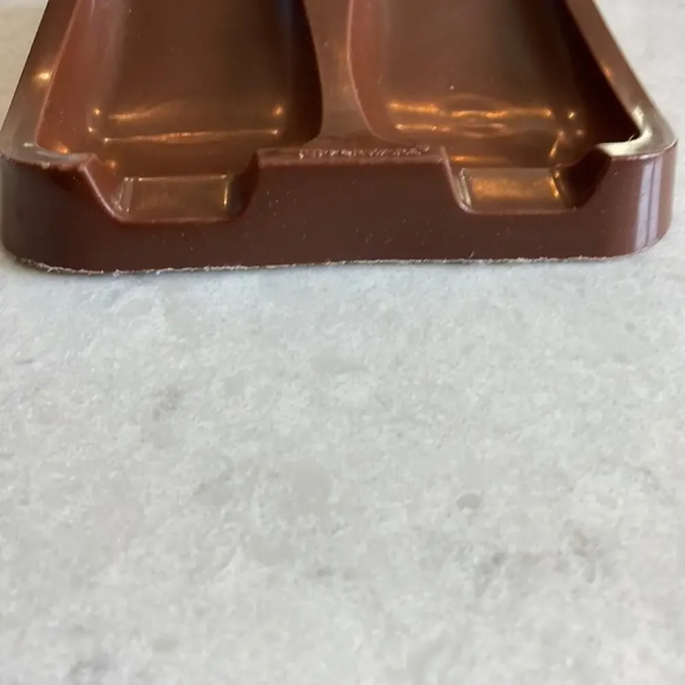 Vintage Tupperware spoon rest